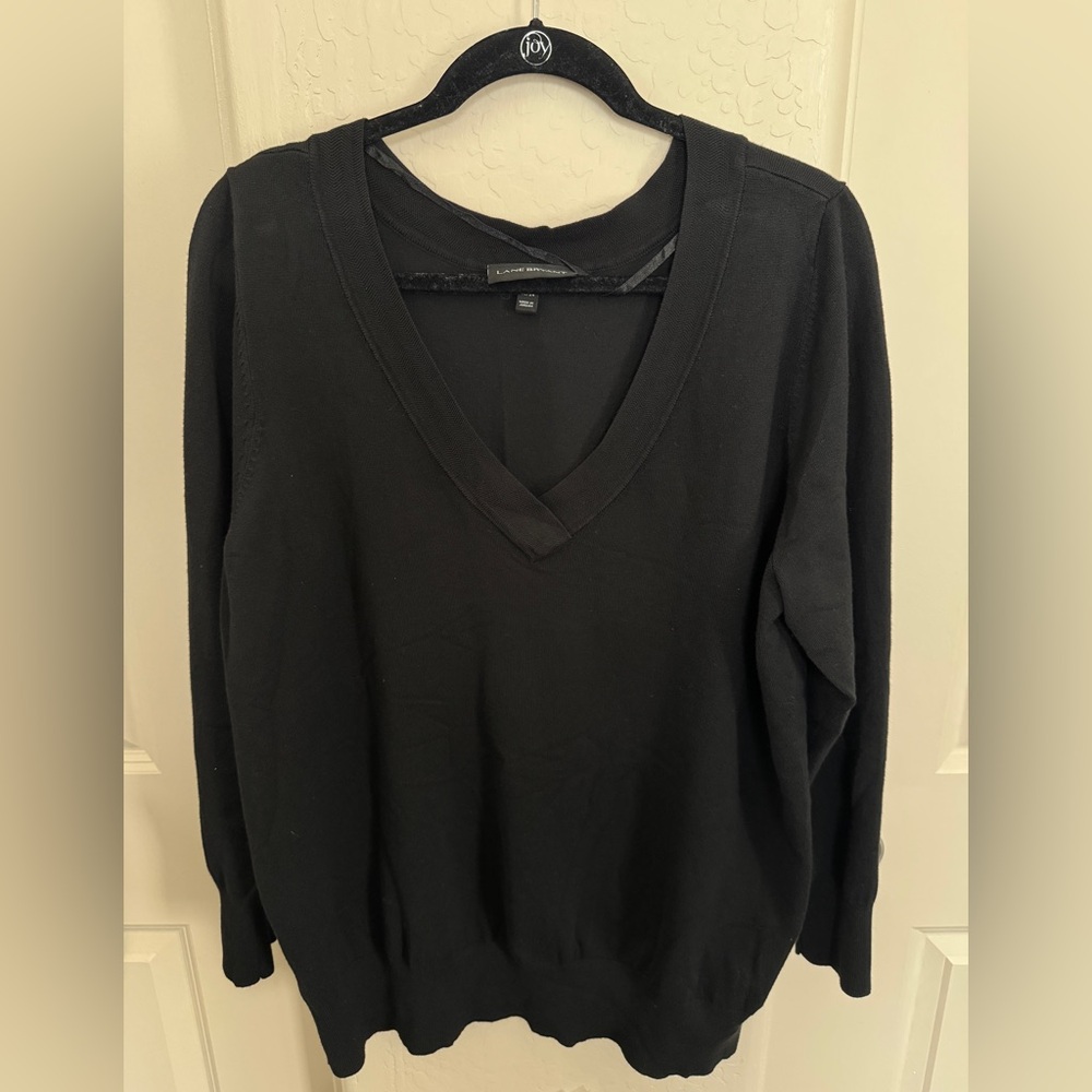 Long sleeve black sweater. Size 22/24